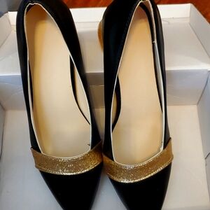 Womans black and gold dress pumps